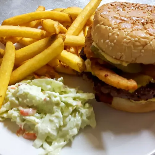Burger with fries and coleslaw